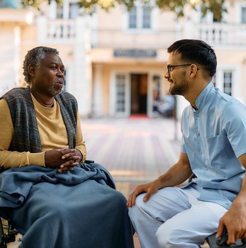 Man in wheelchair with doctor