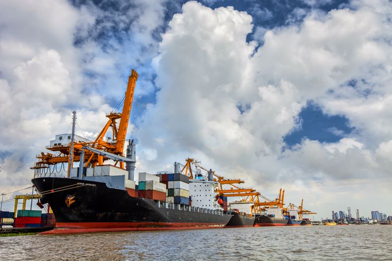 Container ships engage in international trade.