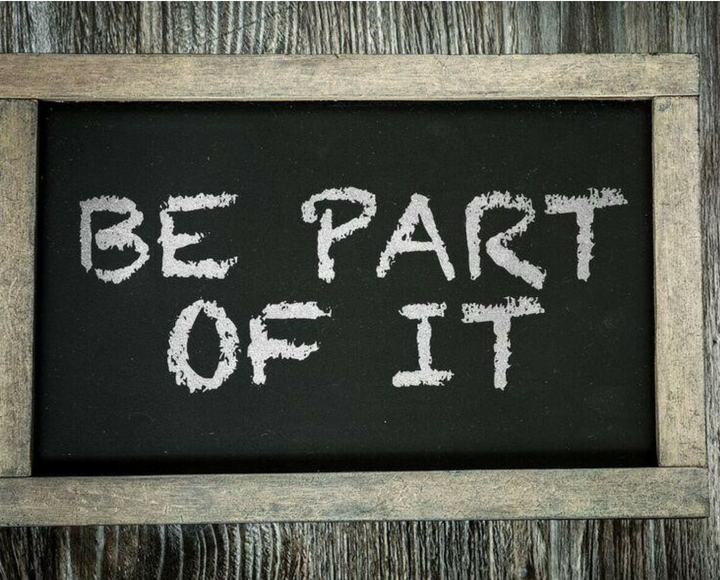 Chalkboard with Be Part of It written on it