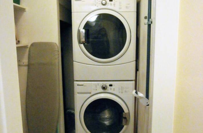 In-Suite Laundry room, Stairwell, and Entry with closet