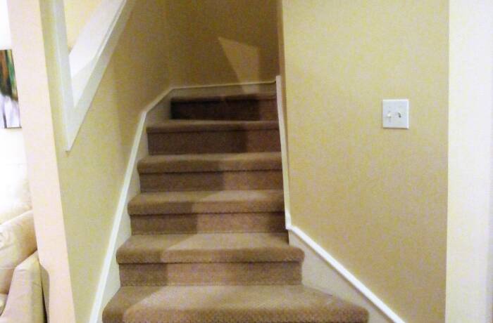 In-Suite Laundry room, Stairwell, and Entry with closet