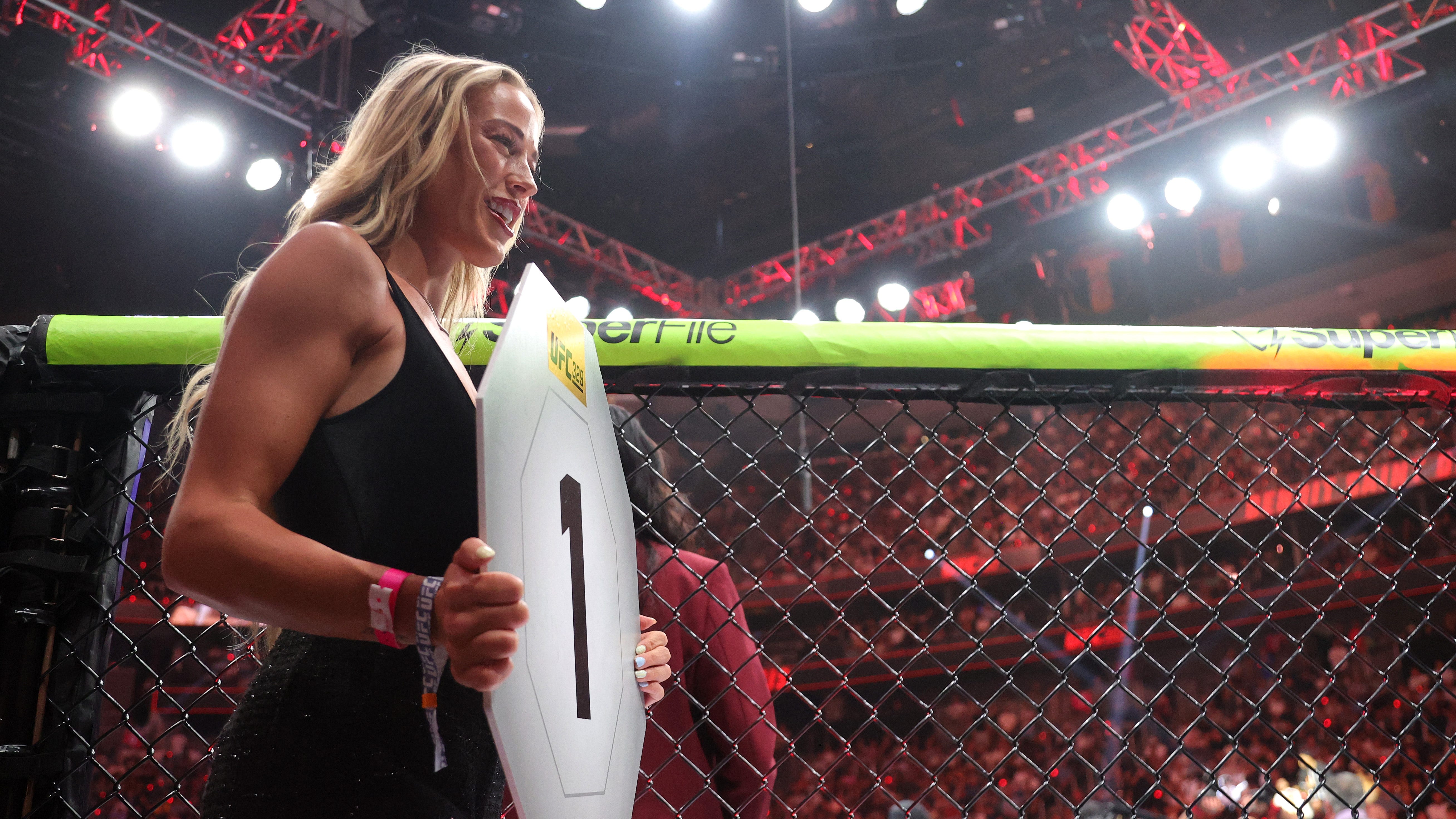WNBA star Sophie Cunningham works at UFC 329 octagon girl