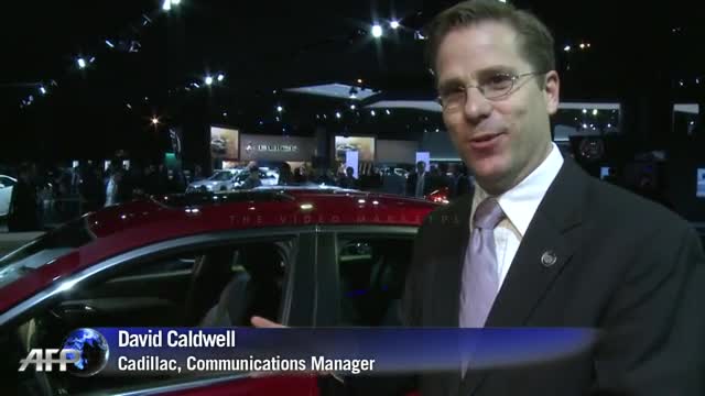 Luxury cars dazzle at auto show as US firms bid to