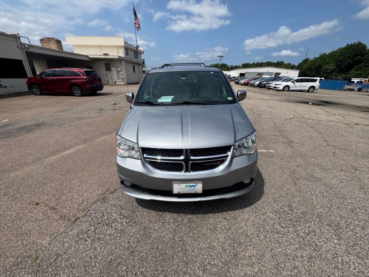 Silver Dodge Grand Caravan image number 1