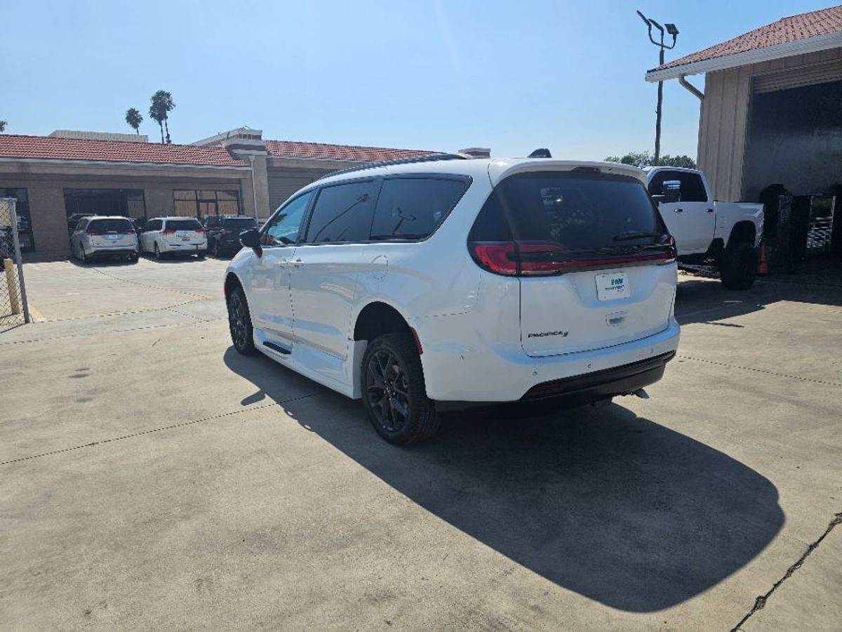 White Chrysler Pacifica with Side Entry Automatic In Floor ramp