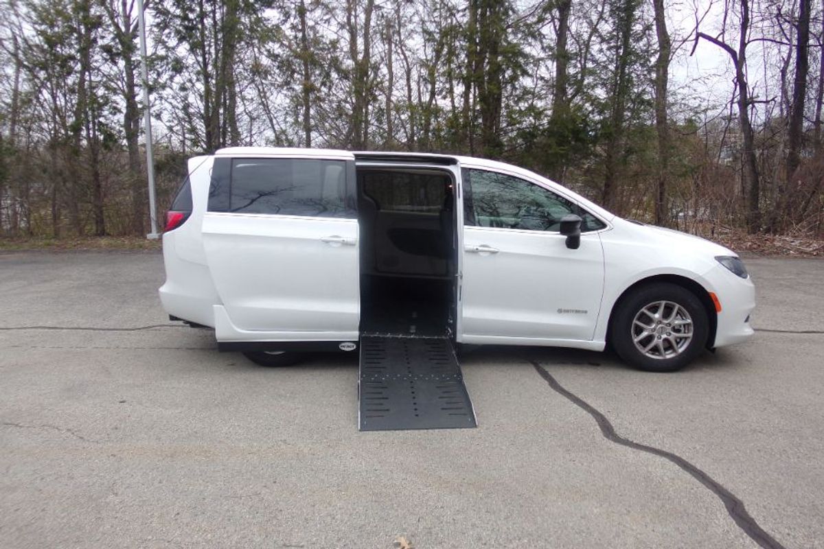 White Chrysler Voyager with Side Entry Automatic Fold Out ramp