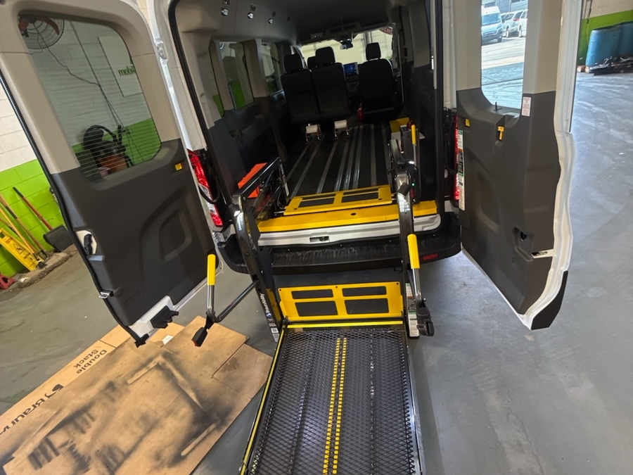 White Ford T350 with Rear Entry Automatic Fold Out ramp
