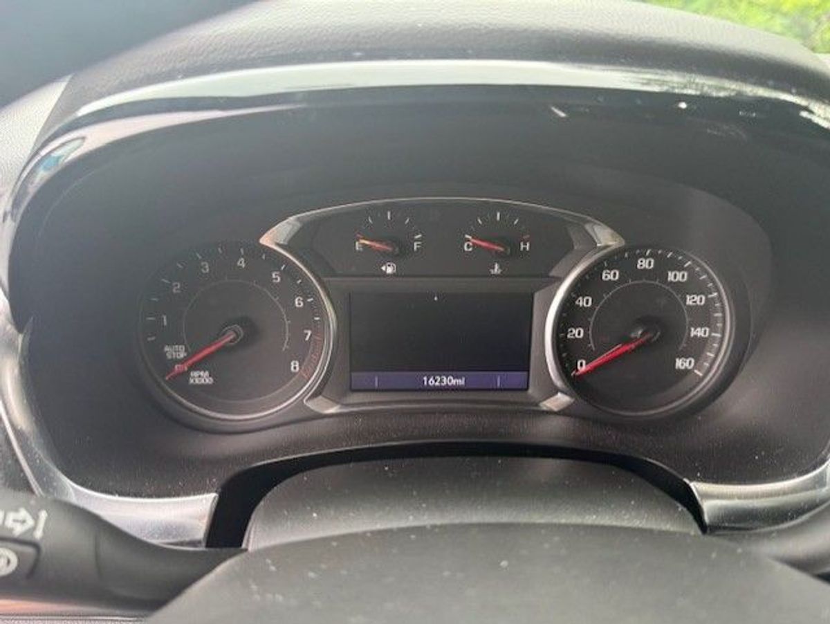 Silver Chevrolet Traverse with Side Entry Automatic In Floor ramp