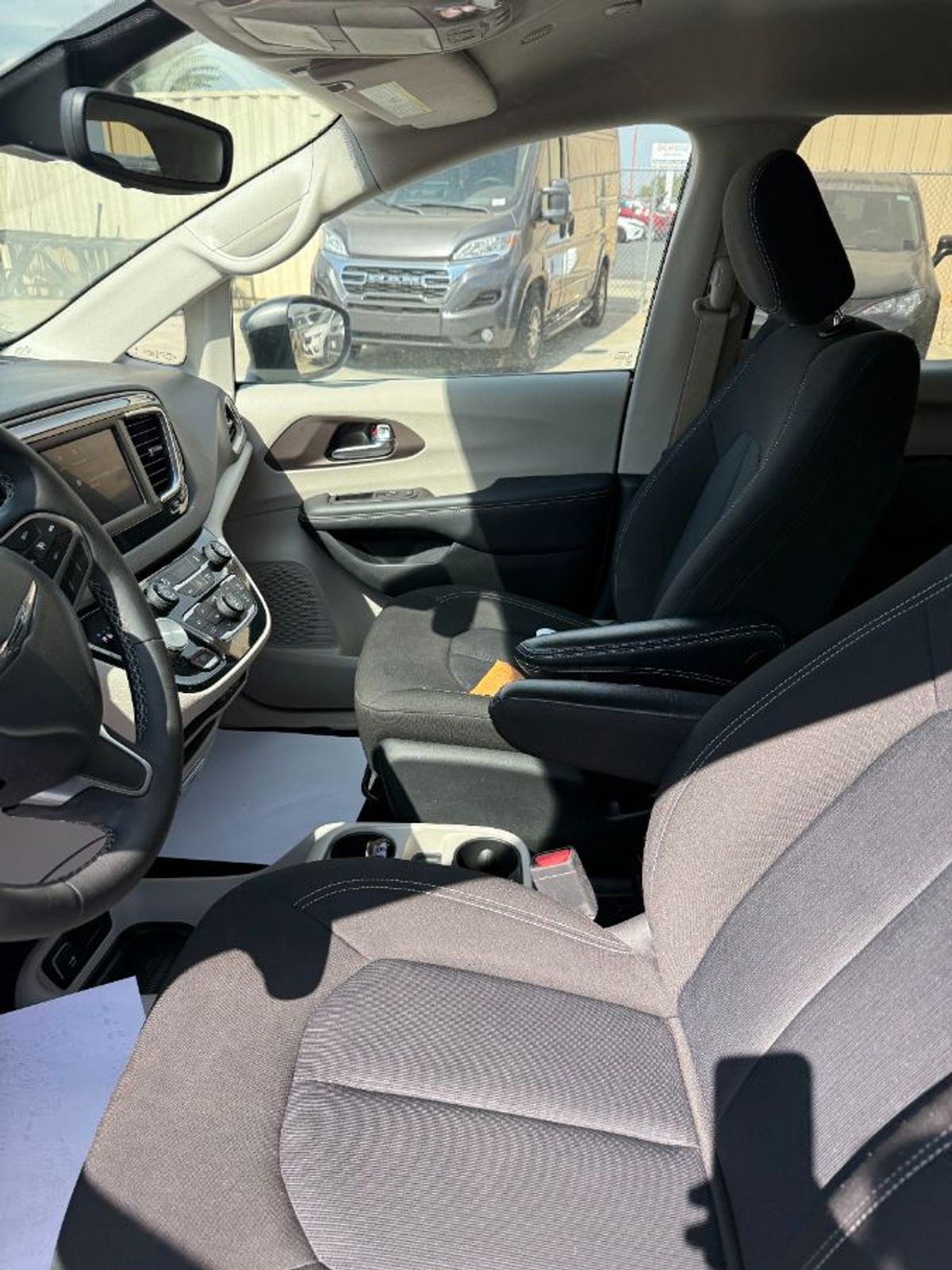 Black Chrysler Voyager with Rear Entry Manual Fold Out ramp