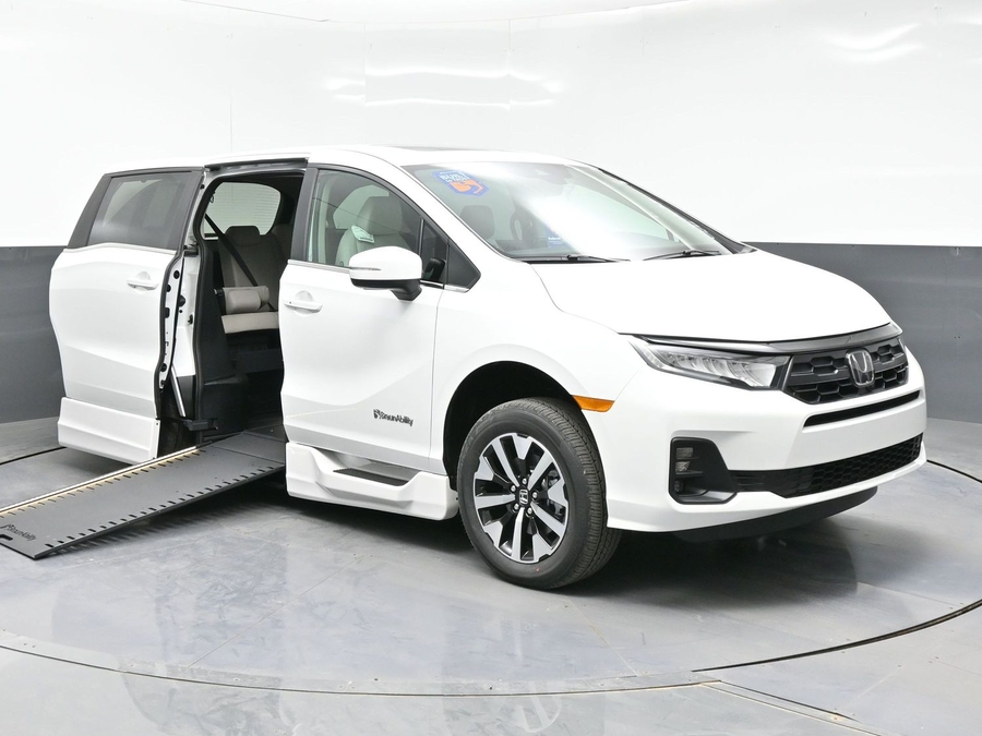White Honda Odyssey with Side Entry Automatic In Floor ramp