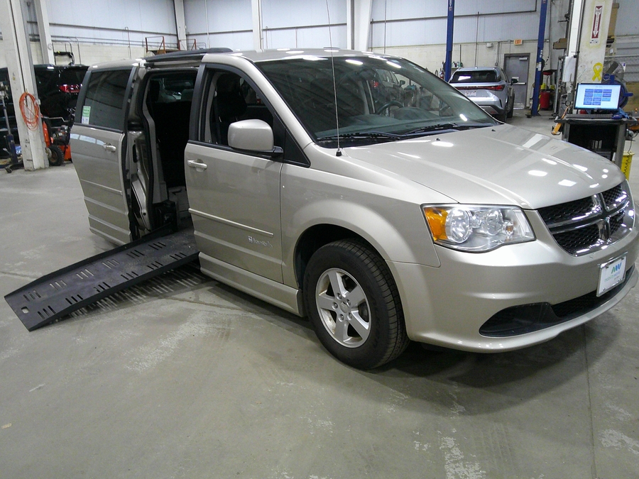 Brown Dodge Grand Caravan with Side Entry Automatic Fold Out ramp