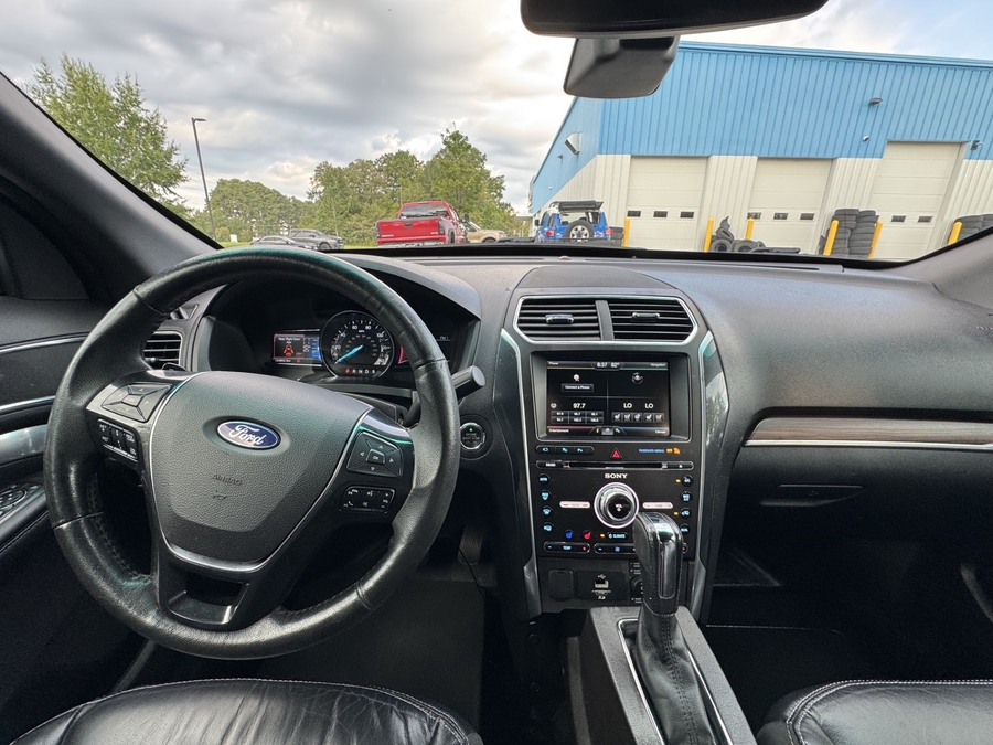Black Ford Explorer image number 8