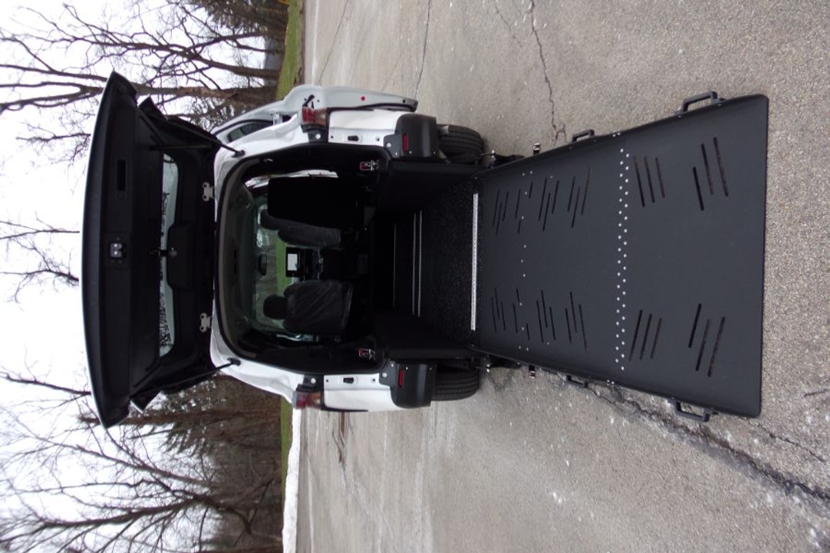 White Toyota Sienna with Rear Entry Manual Fold Out ramp