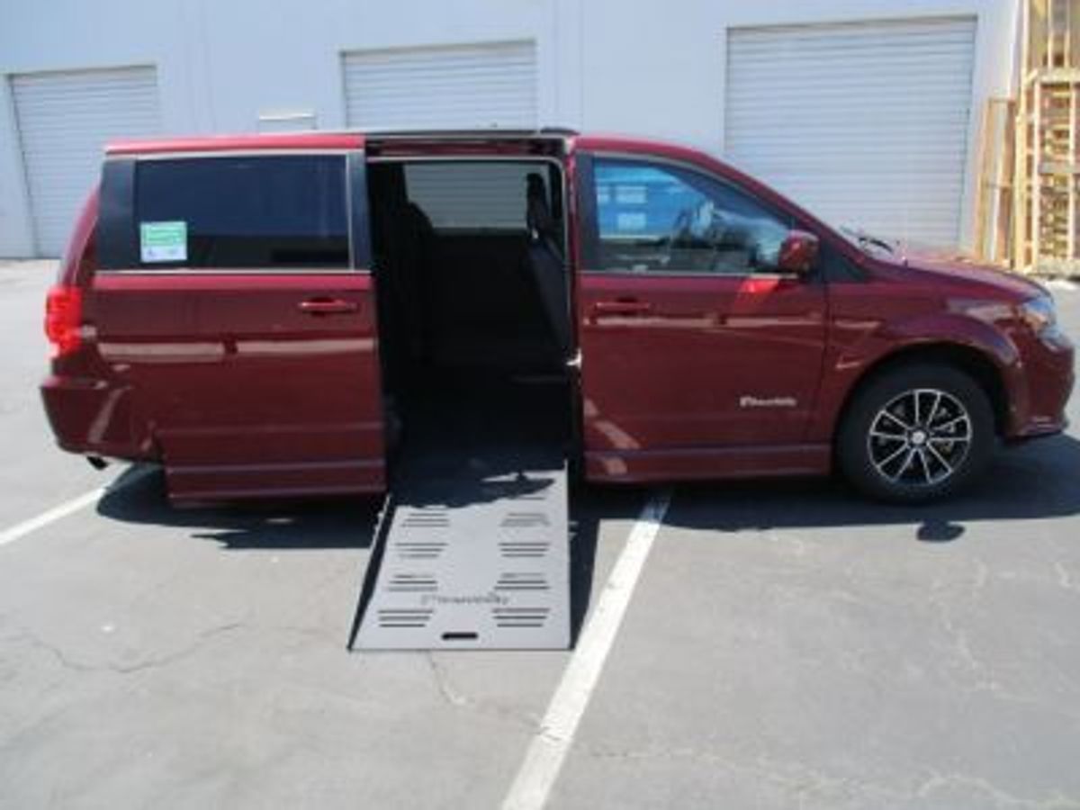 Red Dodge Grand Caravan with Side Entry Automatic Fold Out ramp