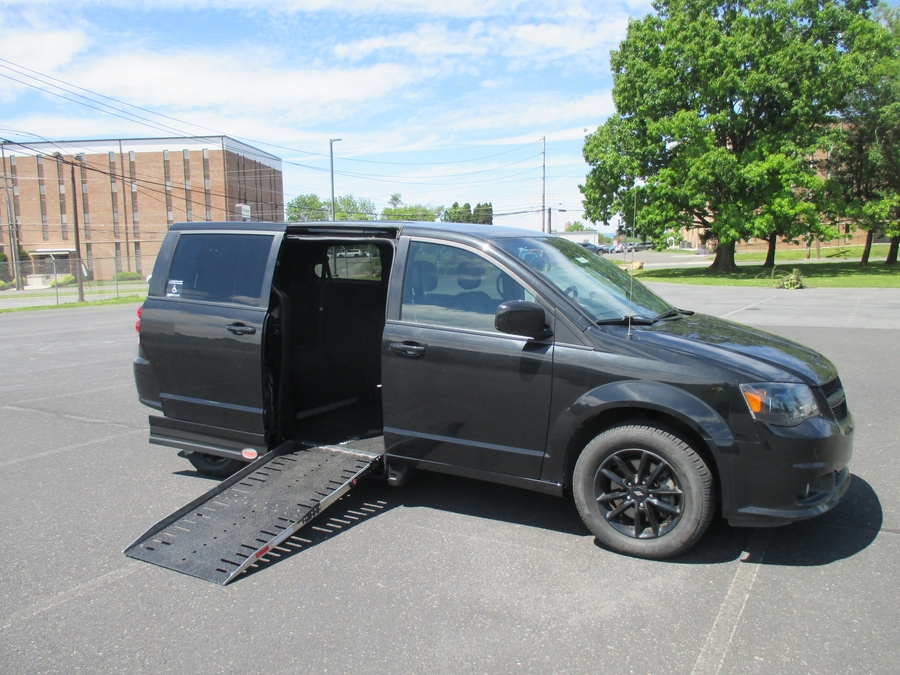 Red Dodge Grand Caravan with Side Entry Automatic Fold Out ramp