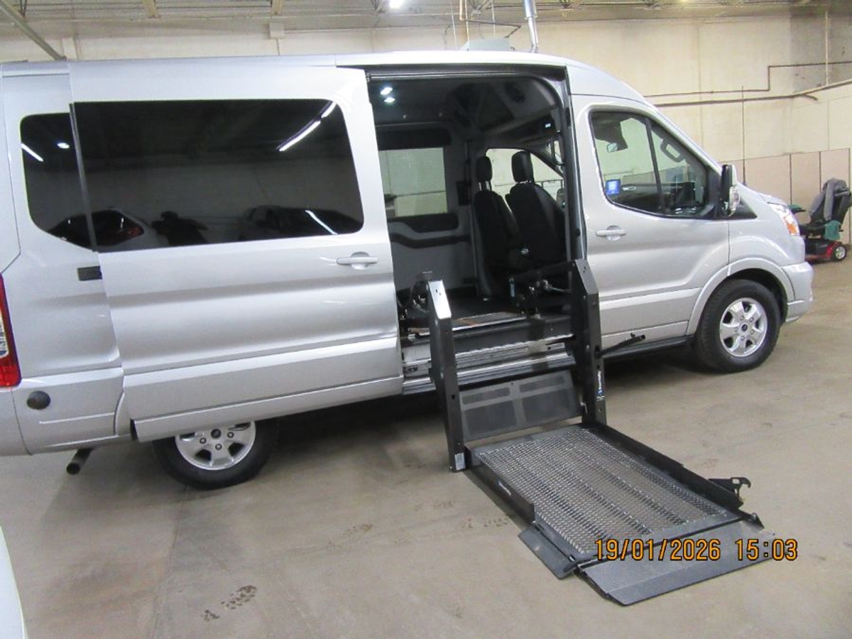 Silver Ford T250 with Side Entry Automatic Fold Out ramp