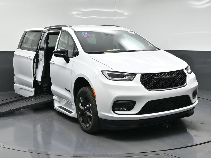 White Chrysler Pacifica with Side Entry Automatic Fold Out ramp
