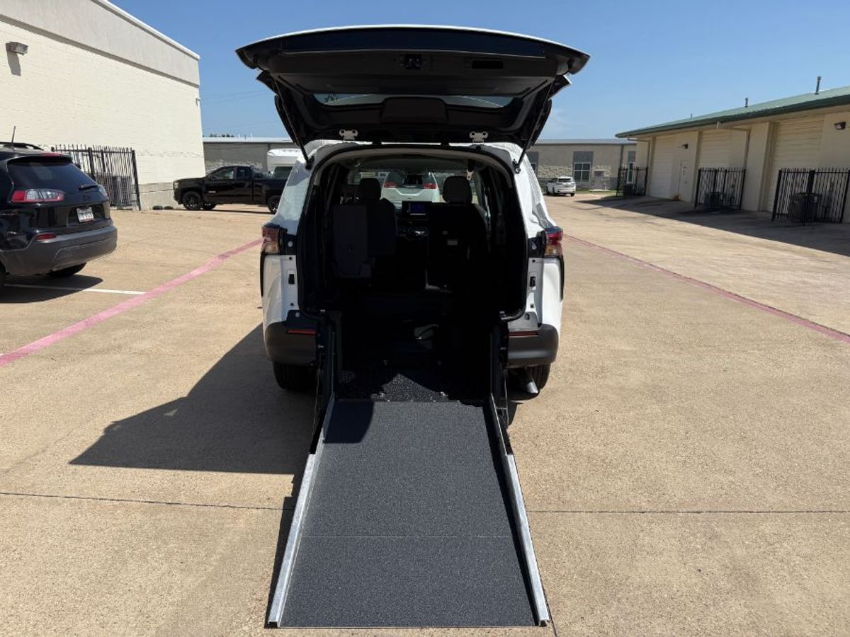 White Toyota Sienna with Rear Entry Manual Fold Out ramp