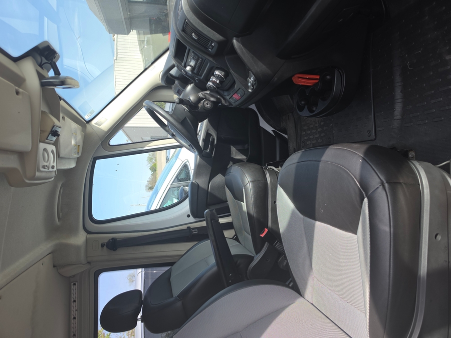 White Ram ProMaster with Rear Entry Automatic Fold Out ramp