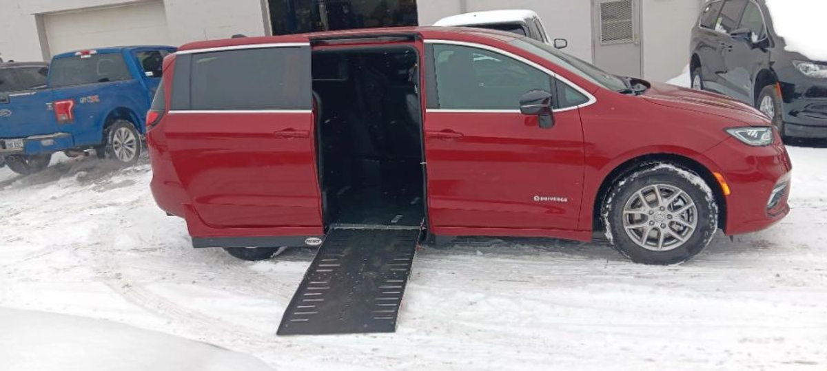 Red Chrysler Pacifica with Side Entry Automatic Fold Out ramp