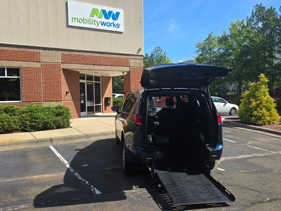Blue Chrysler Pacifica with Rear Entry Manual Fold Out ramp