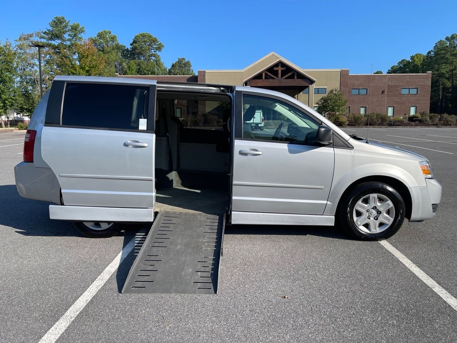 Silver Dodge Grand Caravan with Side Entry Automatic Fold Out ramp