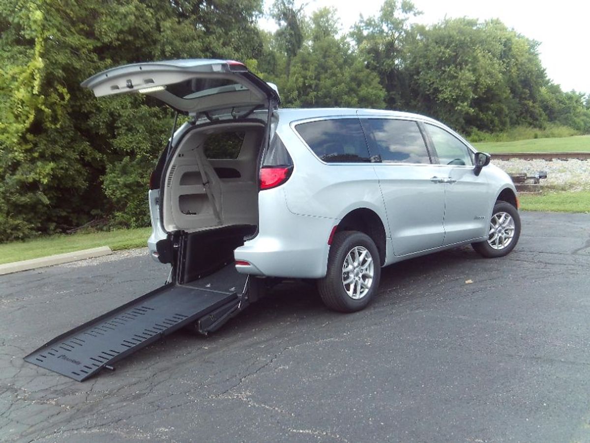 Silver Chrysler Voyager with Rear Entry Manual Fold Out ramp