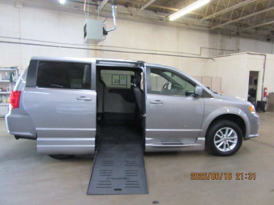 Silver Dodge Grand Caravan with Side Entry Automatic Fold Out ramp