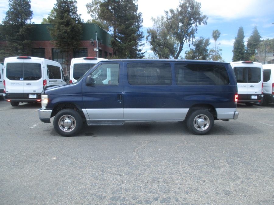 Blue-grey Ford Econoline with Side Entry Automatic Fold Out ramp