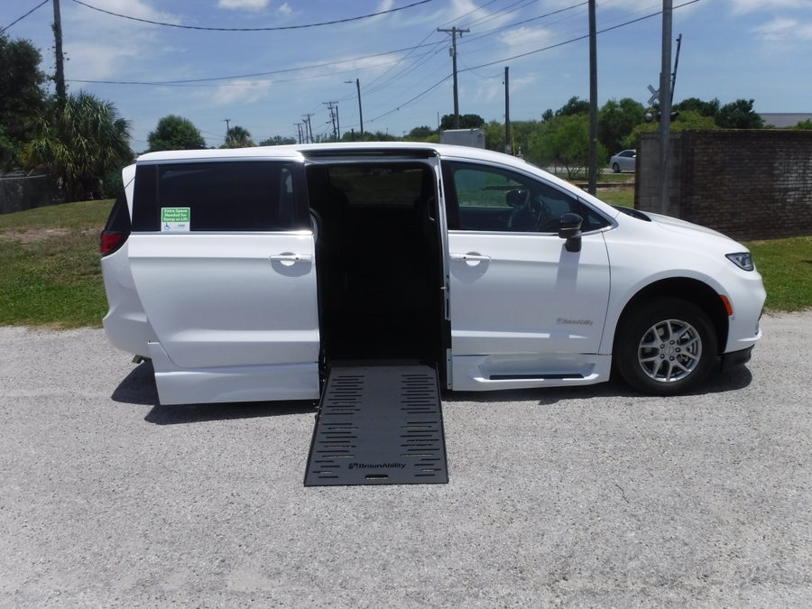 White Chrysler Pacifica with Side Entry Automatic Fold Out ramp