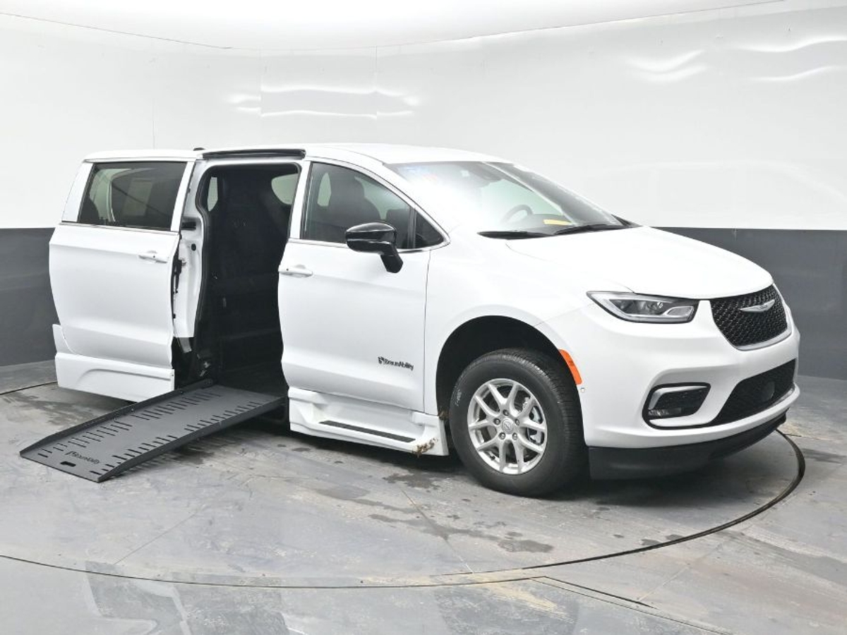 White Chrysler Pacifica with Side Entry Automatic Fold Out ramp