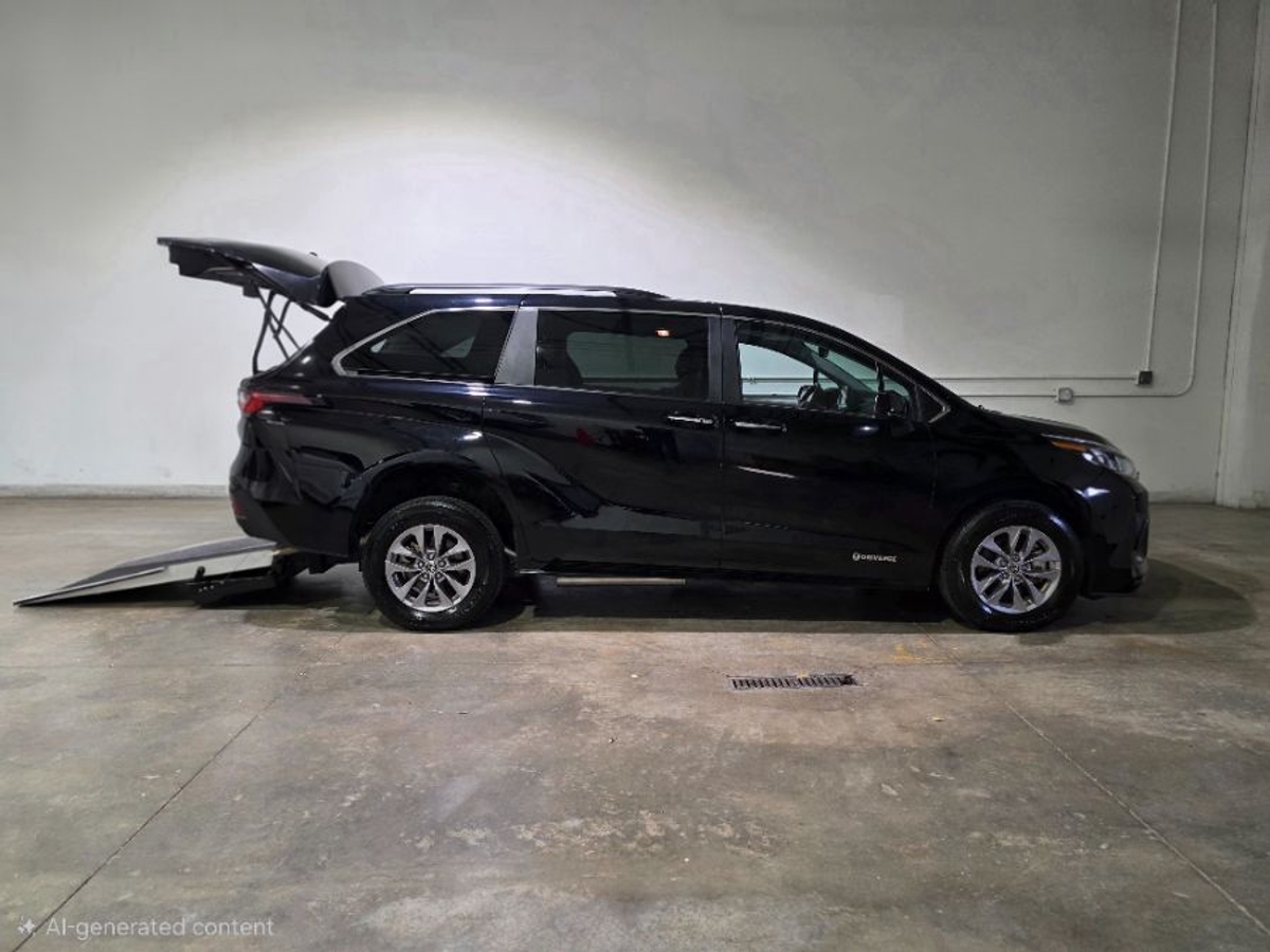 Black Toyota Sienna with Rear Entry Manual Fold Out ramp