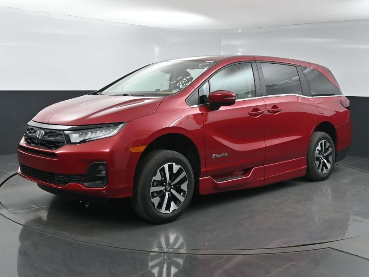 Red Honda Odyssey image number 3