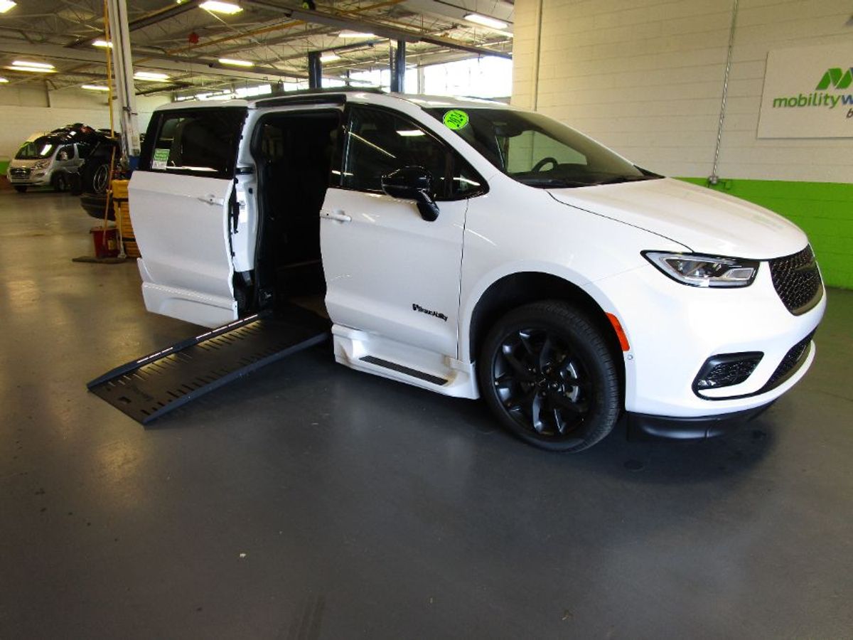 White Chrysler Pacifica with Side Entry Automatic Fold Out ramp