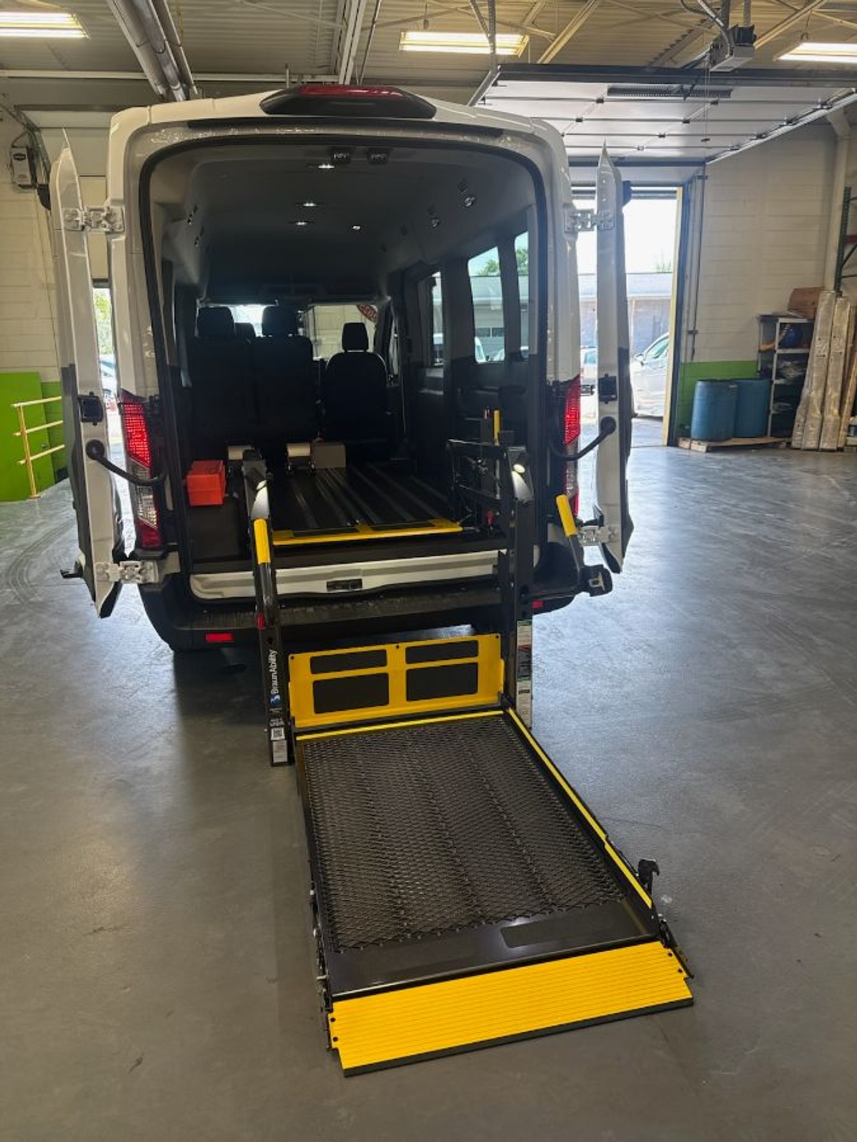 White Ford T350 with Rear Entry Automatic Fold Out ramp
