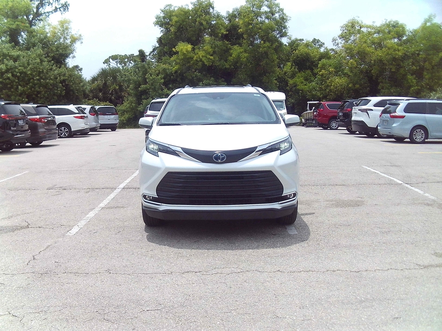 White Toyota Sienna with Side Entry Automatic Fold Out ramp