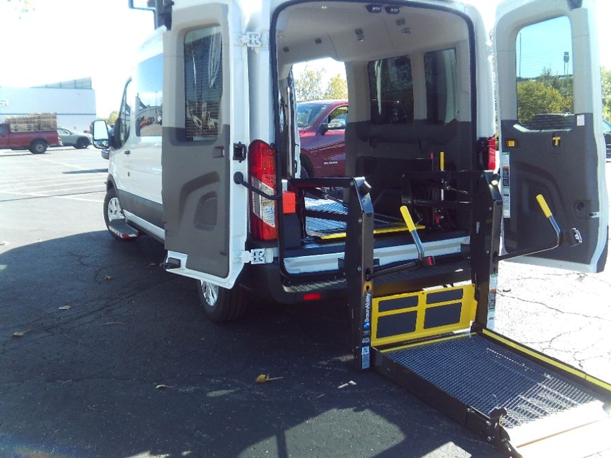 White Ford T350 with Rear Entry Automatic Fold Out ramp