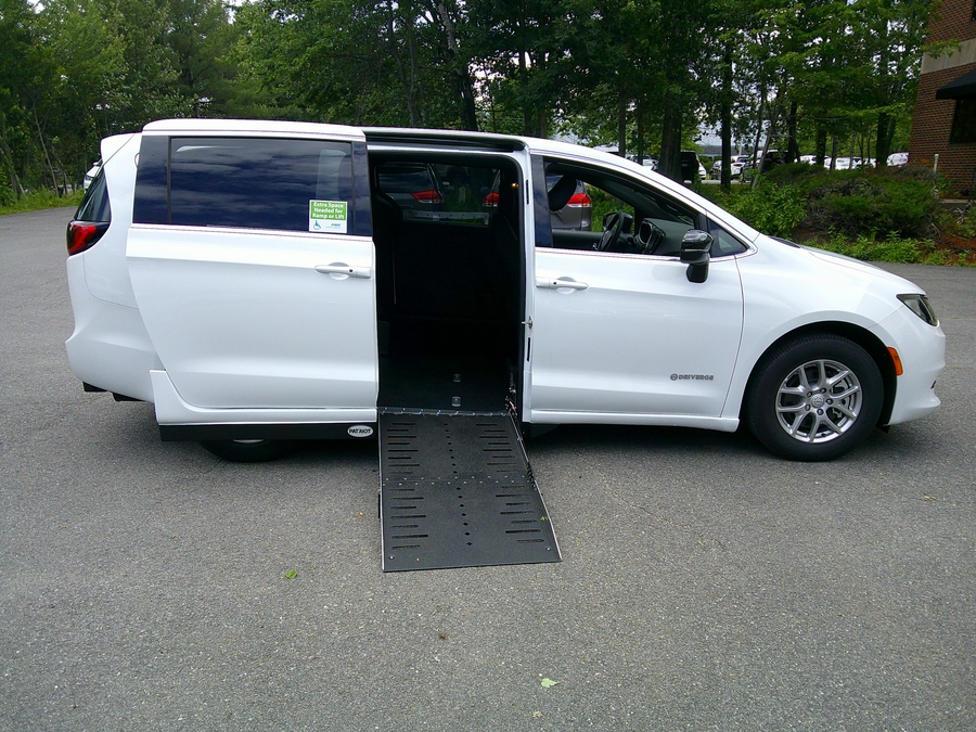 White Chrysler Voyager with Side Entry Automatic Fold Out ramp