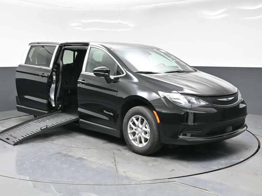 Black Chrysler Voyager with Side Entry Manual Fold Out ramp