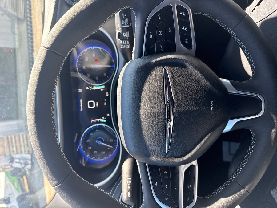 Silver Chrysler Pacifica with Side Entry Automatic Fold Out ramp