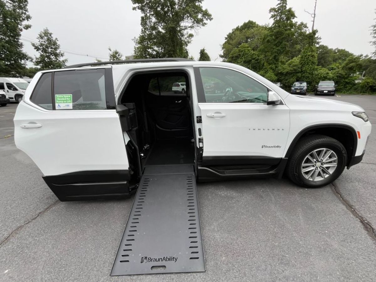 White Chevrolet Traverse with Side Entry Automatic In Floor ramp