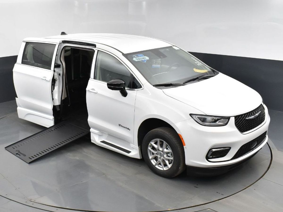 White Chrysler Pacifica with Side Entry Automatic In Floor ramp