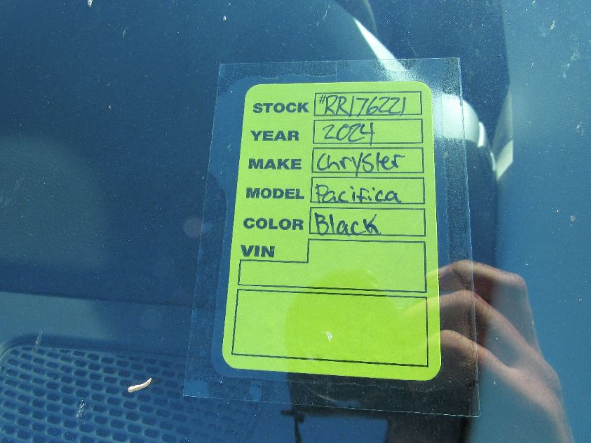 Black Chrysler Pacifica with Side Entry Automatic Fold Out ramp