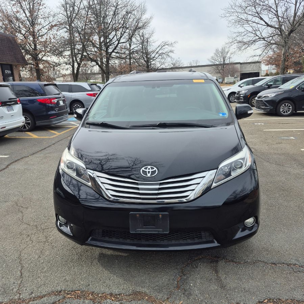 Black Toyota Sienna with Side Entry Automatic In Floor ramp