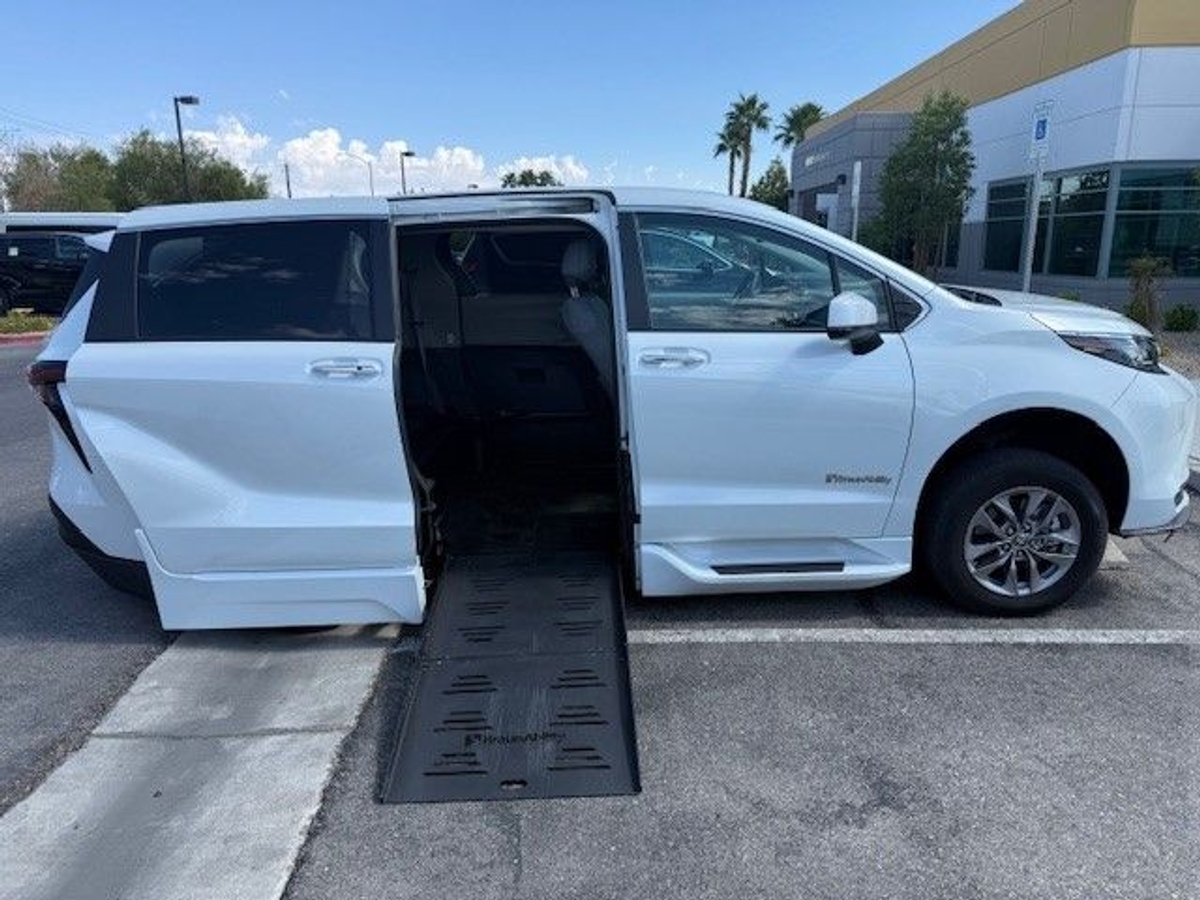 White Toyota Sienna with Side Entry Automatic Fold Out ramp