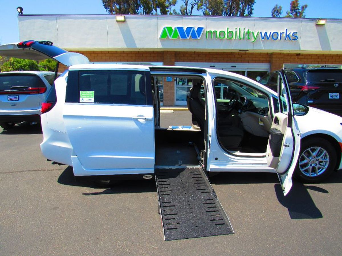 White Chrysler Pacifica with Side Entry Automatic Fold Out ramp