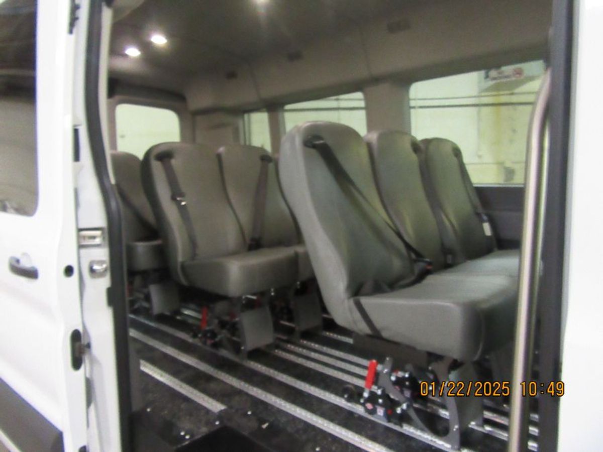 White Ford Transit with N/A N/A N/A ramp