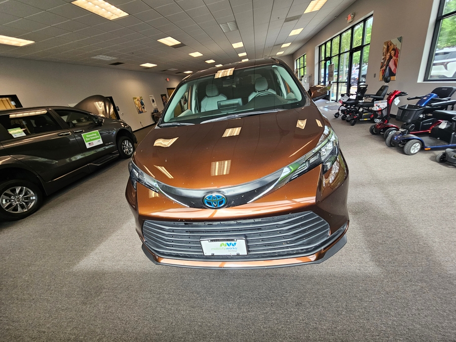 Orange Toyota Sienna with Rear Entry Manual Fold Out ramp