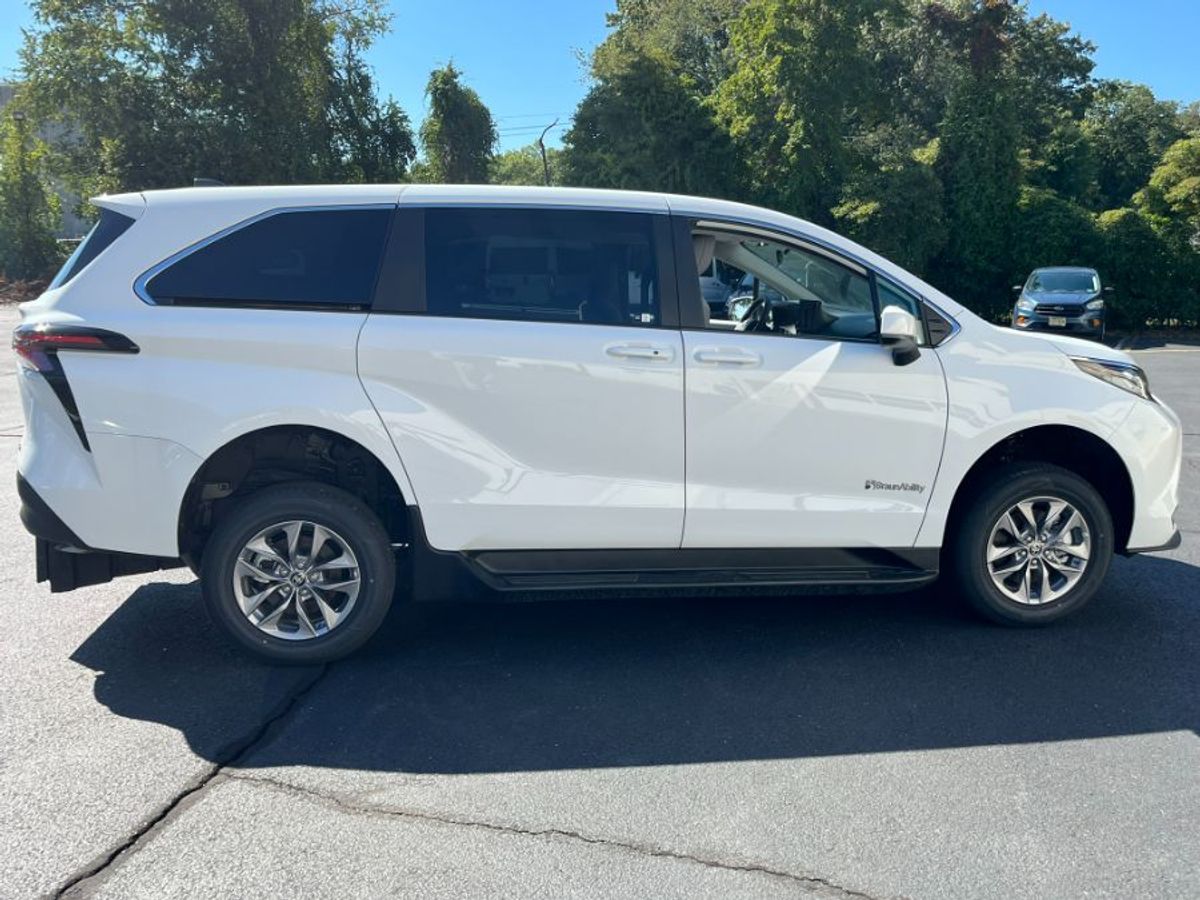 White Toyota Sienna with Rear Entry Manual Fold Out ramp