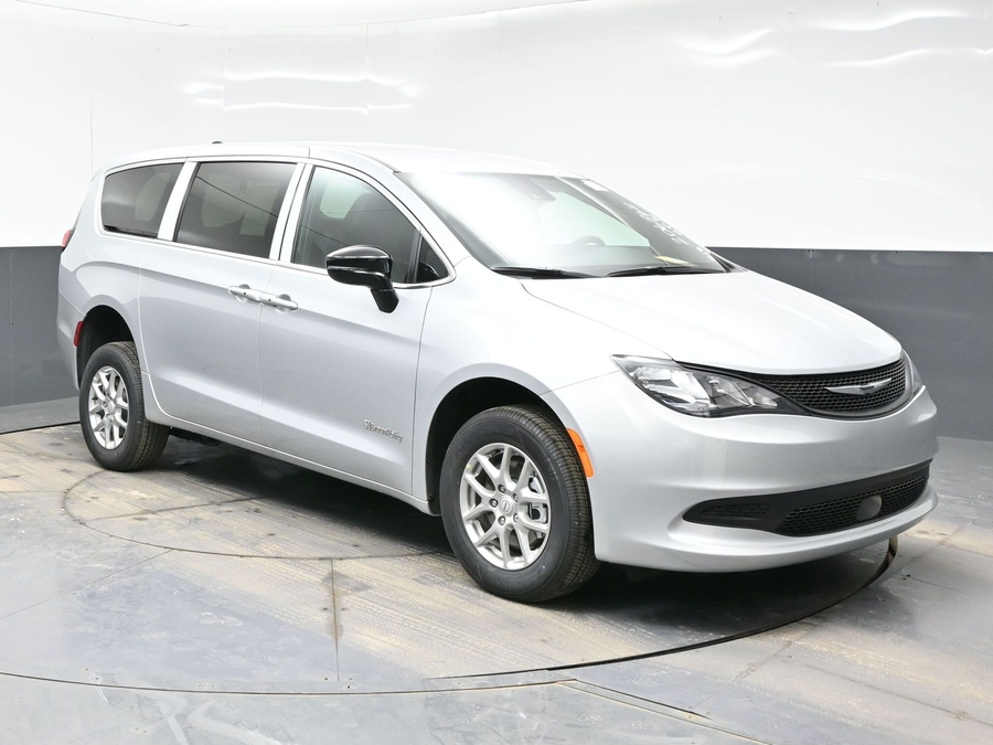 Silver Chrysler Voyager with Rear Entry Manual Fold Out ramp